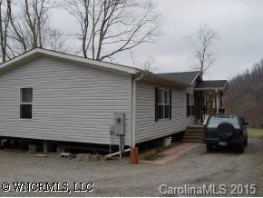 619 Short Ridge Lane Clyde, NC 28721 - Photo 1 of 9 a view of a house with a patio
