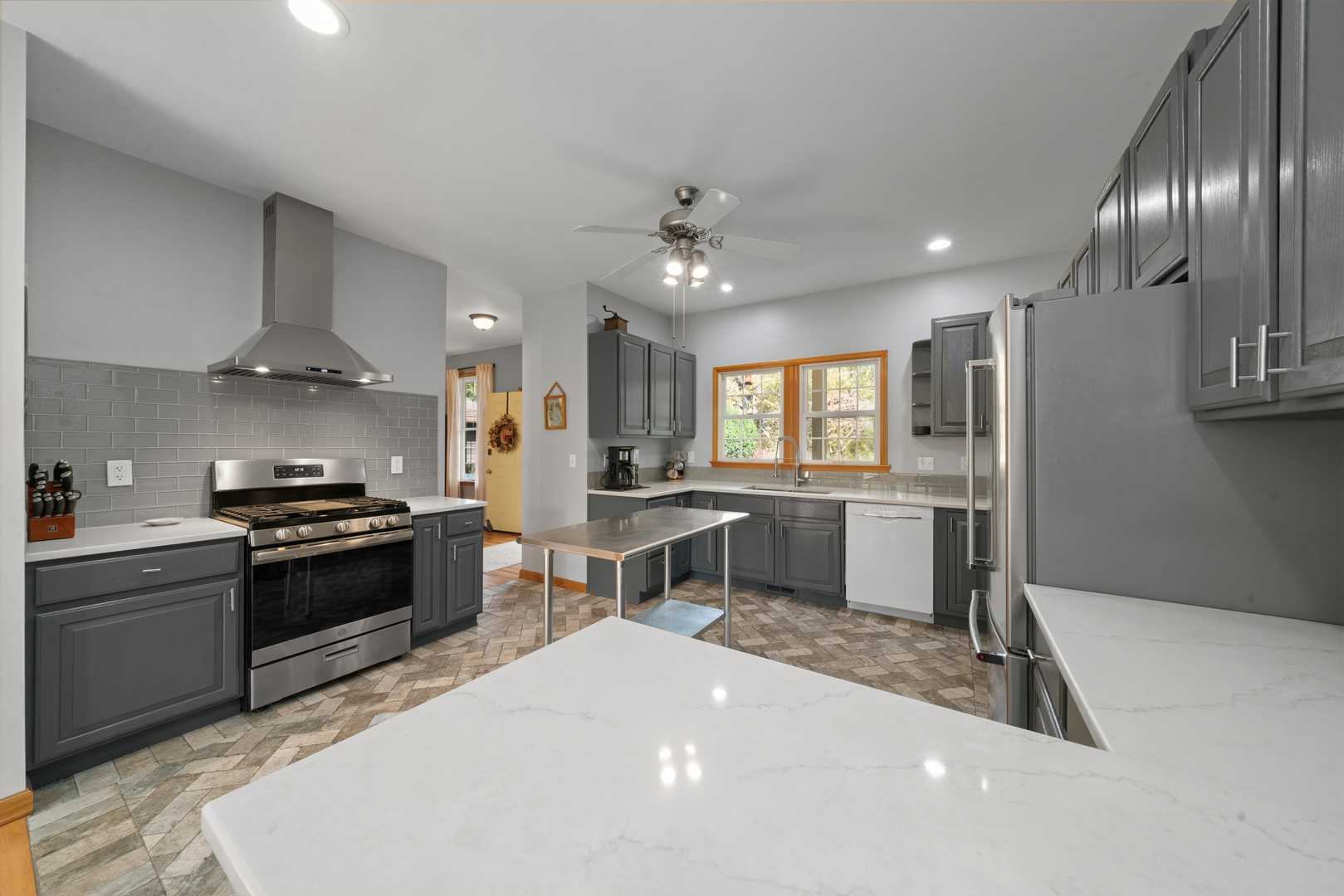 43W140 Campton Hills Road Elburn, IL 60119 - Photo 15 of 54 a kitchen with stainless steel appliances granite countertop a sink stove and refrigerator