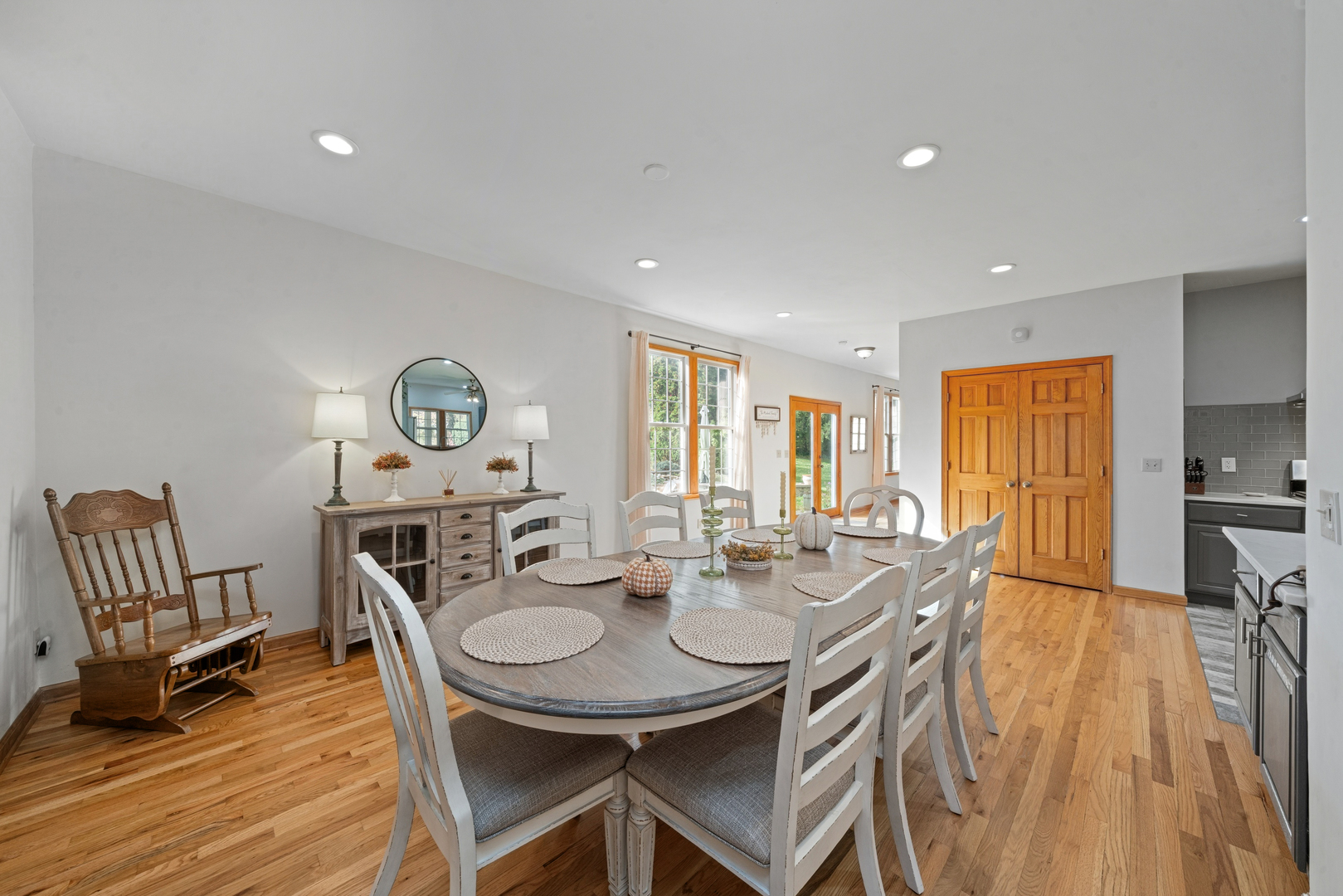 43W140 Campton Hills Road Elburn, IL 60119 - Photo 17 of 54 a view of a dining room with furniture and wooden floor