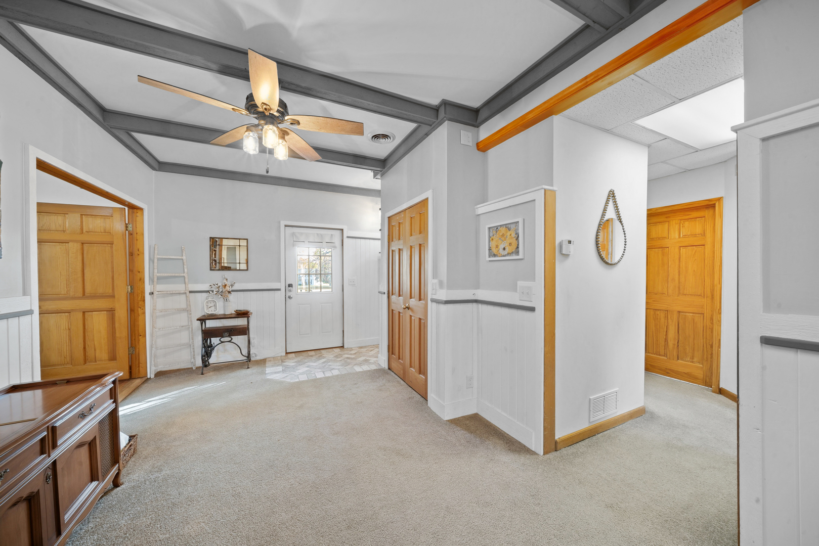 43W140 Campton Hills Road Elburn, IL 60119 - Photo 19 of 54 a view of a livingroom with furniture and a ceiling fan