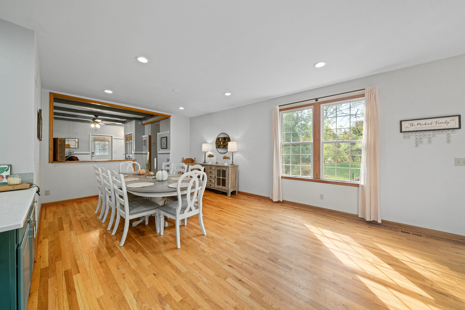 43W140 Campton Hills Road Elburn, IL 60119 - Photo 20 of 54 a dining room with furniture and wooden floor