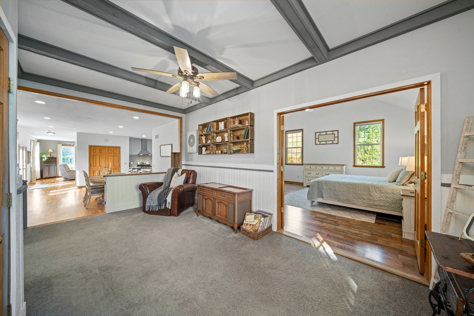 43W140 Campton Hills Road Elburn, IL 60119 - Photo 22 of 54 a living room with furniture and a chandelier