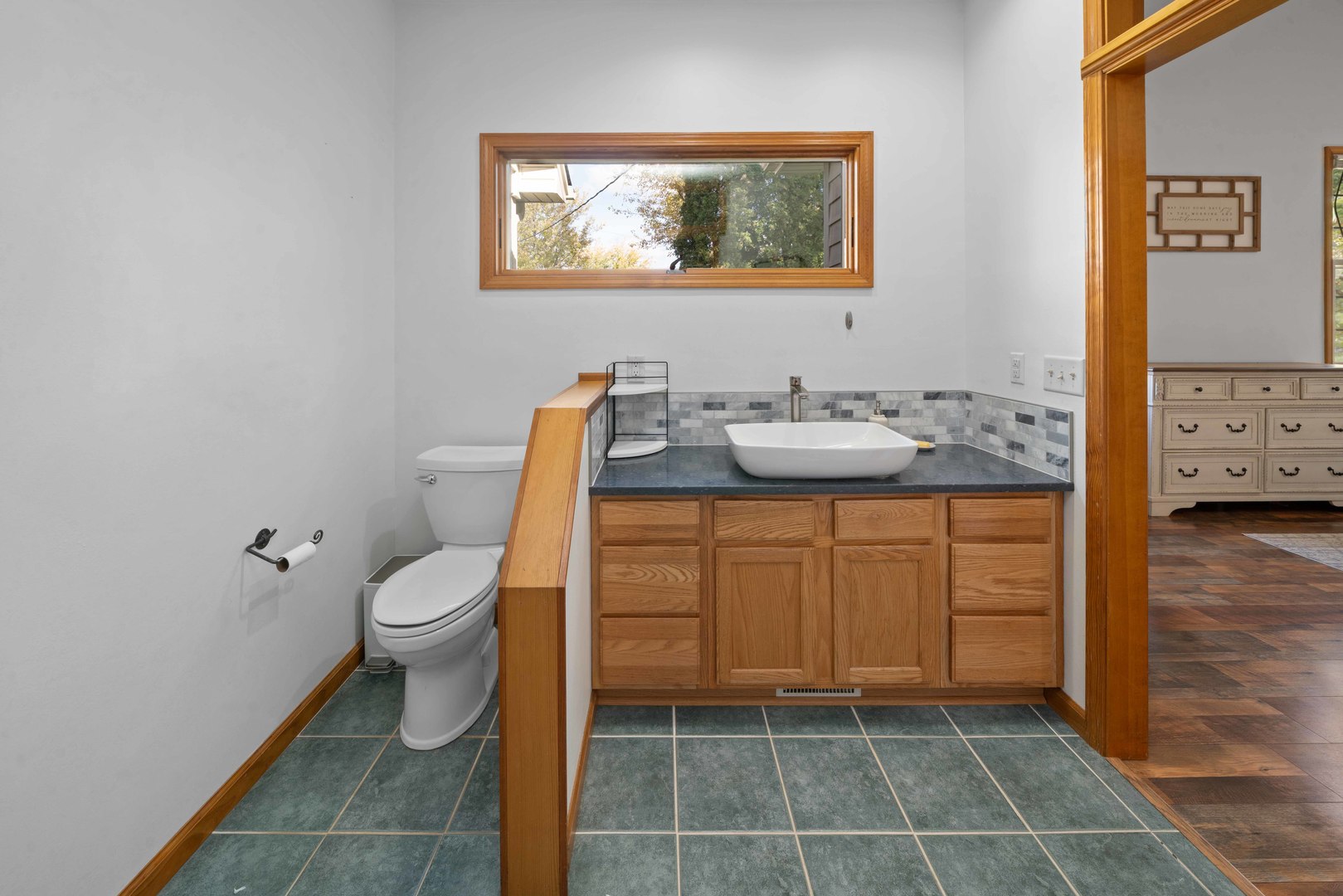 43W140 Campton Hills Road Elburn, IL 60119 - Photo 29 of 54 a bathroom with a toilet sink and mirror
