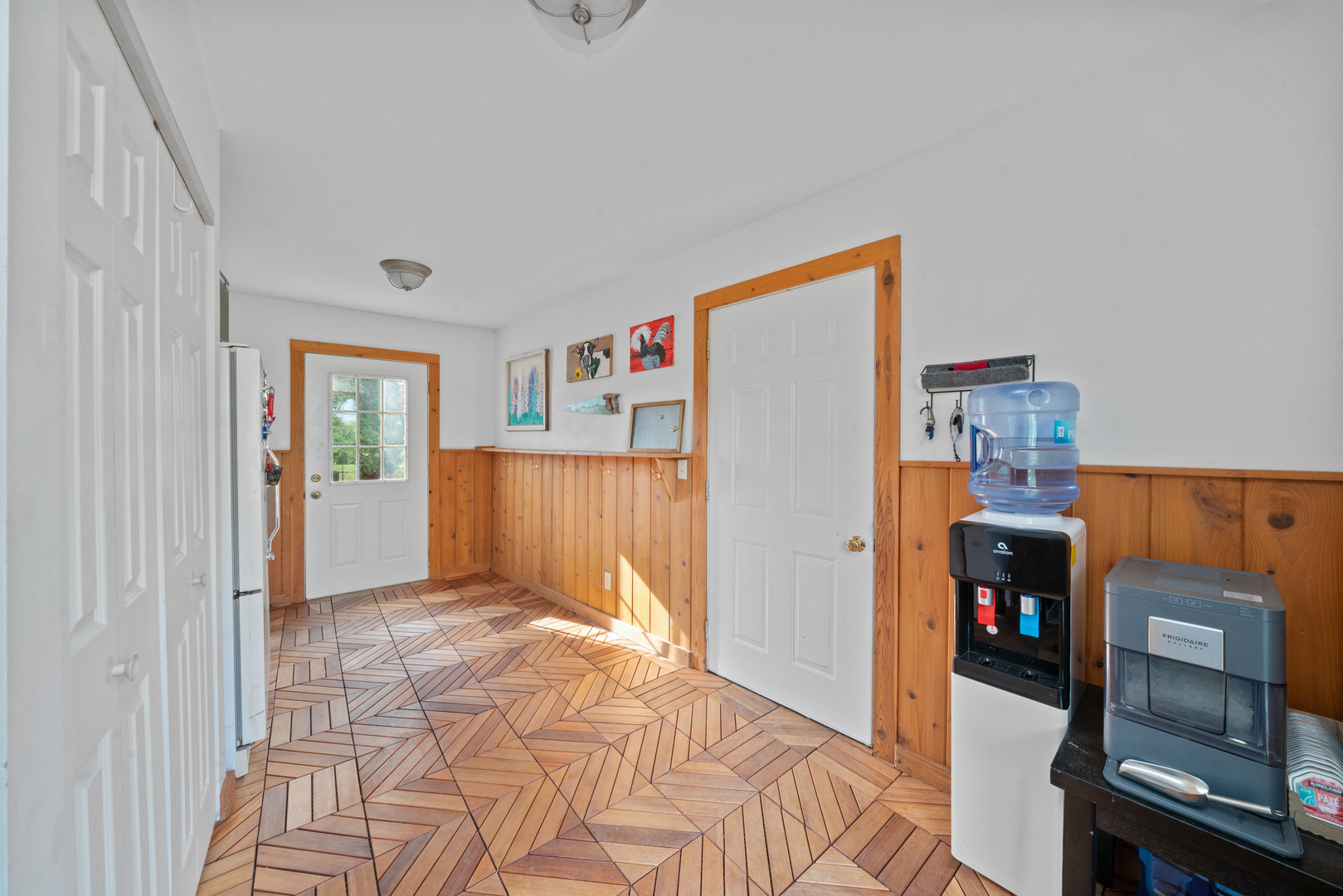 43W140 Campton Hills Road Elburn, IL 60119 - Photo 37 of 54 a view of a livingroom with wooden floor and cabinet