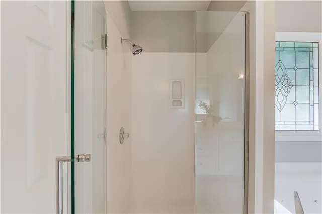 a bathroom with a double vanity sink mirror and double