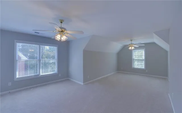 a view of a hallway view with hardwood floor and hallway