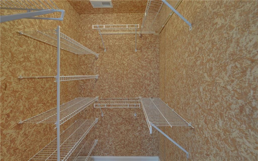 2092 Bakers Mill Road Dacula, GA 30019 - Photo 26 of 65 a bathroom with a shower