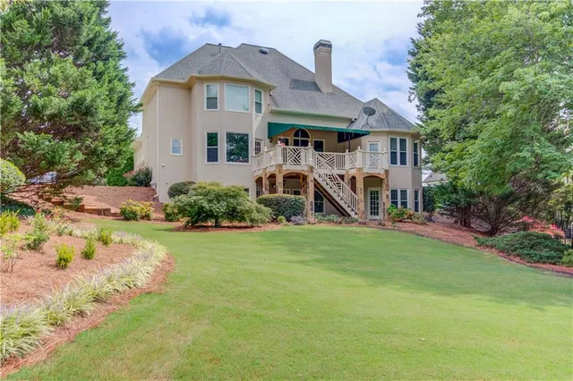 a view of a forest from a balcony