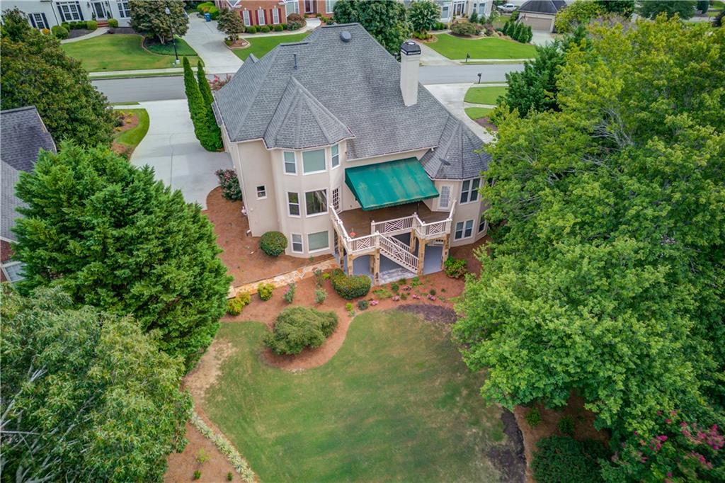 2092 Bakers Mill Road Dacula, GA 30019 - Photo 46 of 65 an aerial view of a house with a garden