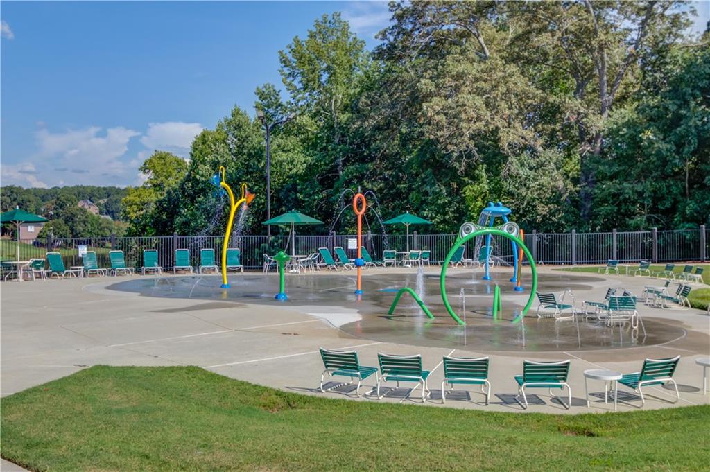 2092 Bakers Mill Road Dacula, GA 30019 - Photo 63 of 65 a view of a house with a yard from a fountain
