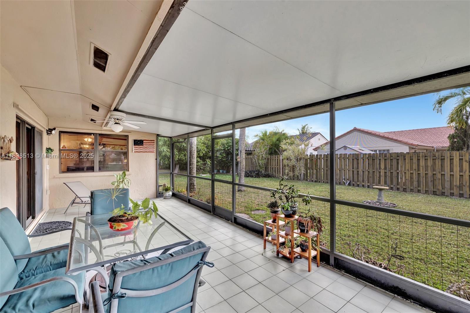 5911 Epsom Court Davie, FL 33331 - Photo 31 of 38 a balcony with furniture and garden view