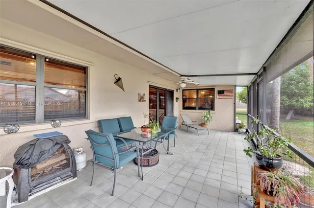 a view of a porch with furniture