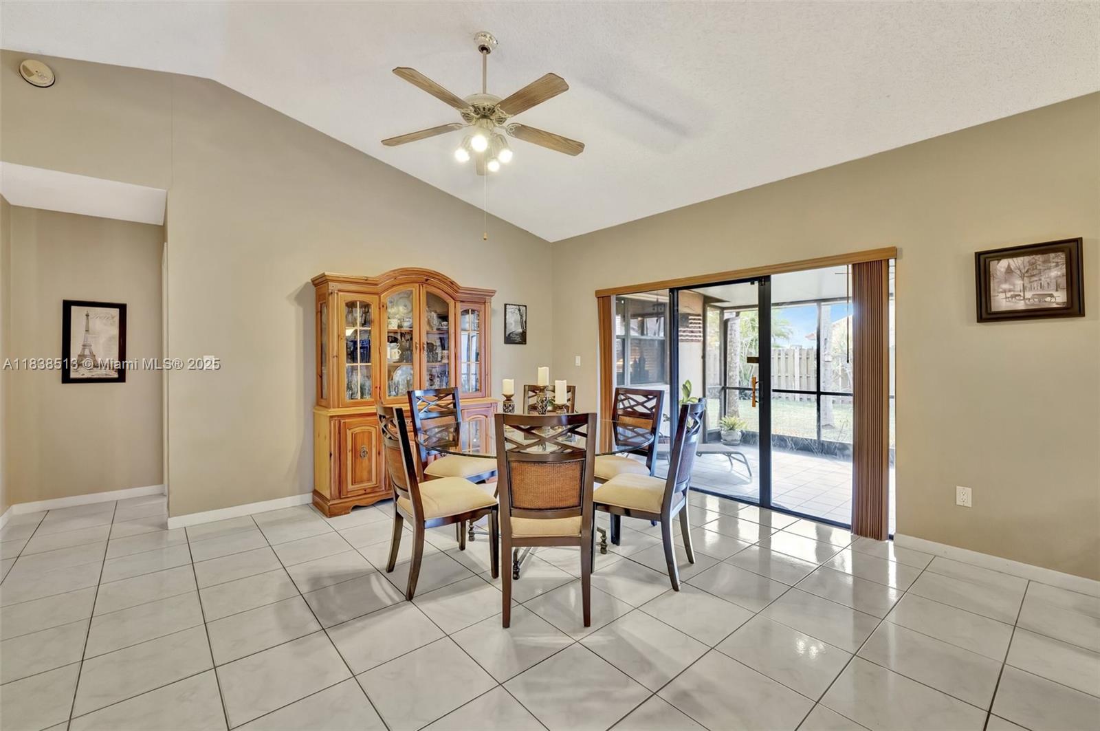 5911 Epsom Court Davie, FL 33331 - Photo 8 of 38 a view of a livingroom with furniture and chandelier