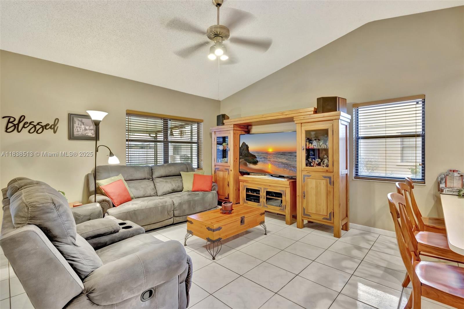5911 Epsom Court Davie, FL 33331 - Photo 10 of 38 a living room with furniture and a large window