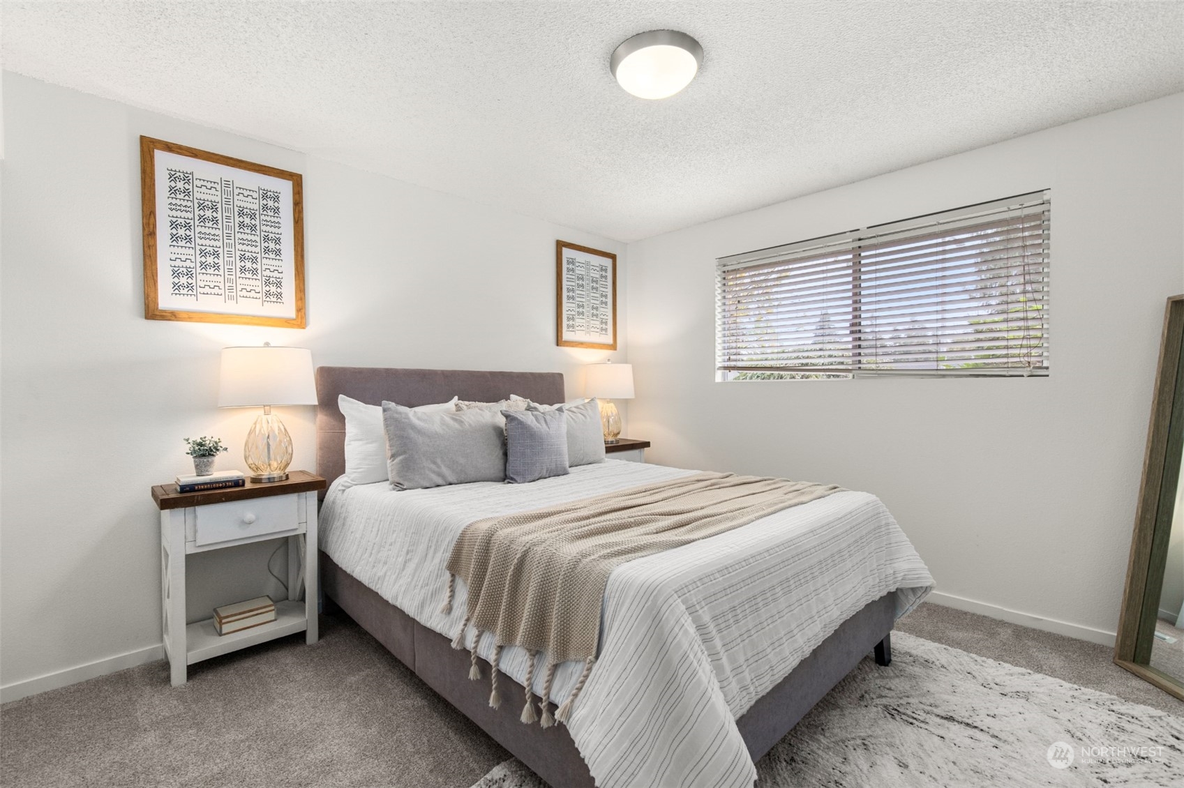 22700 1st Place West Bothell, WA 98021 - Photo 16 of 32 a bedroom with a bed and a window