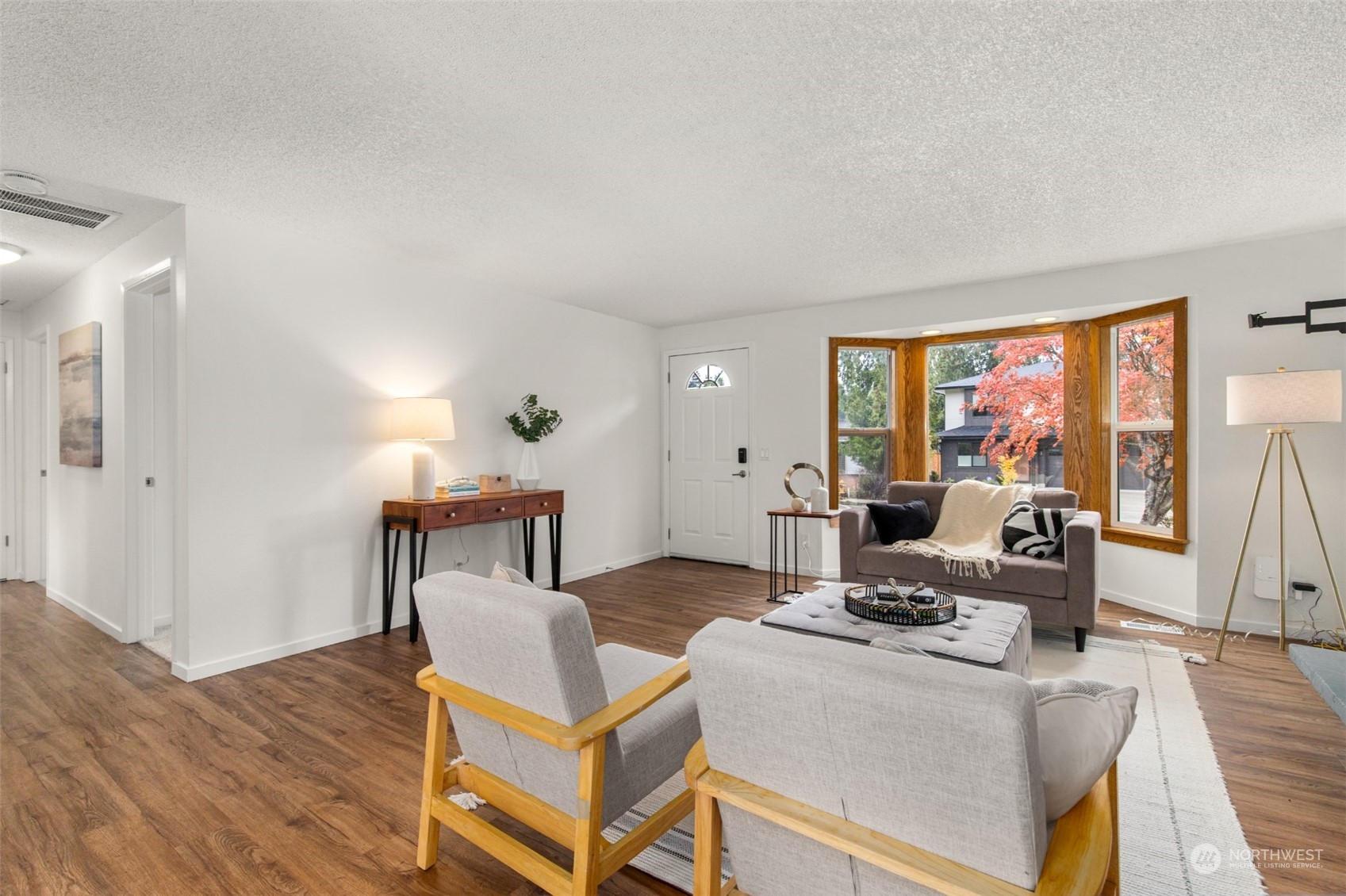 22700 1st Place West Bothell, WA 98021 - Photo 4 of 32 a living room with furniture and a large window