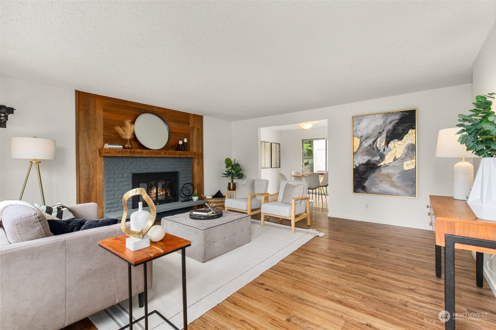 22700 1st Place West Bothell, WA 98021 - Photo 7 of 32 a living room with furniture and a fireplace