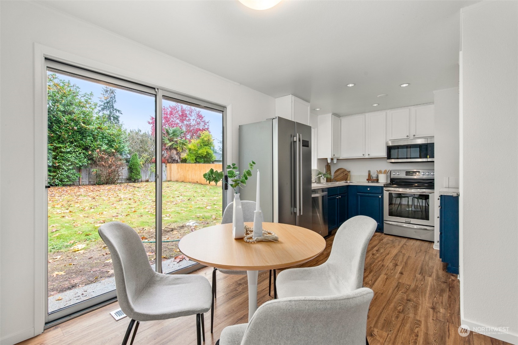 22700 1st Place West Bothell, WA 98021 - Photo 10 of 32 a view of a dining room with furniture window and outside view