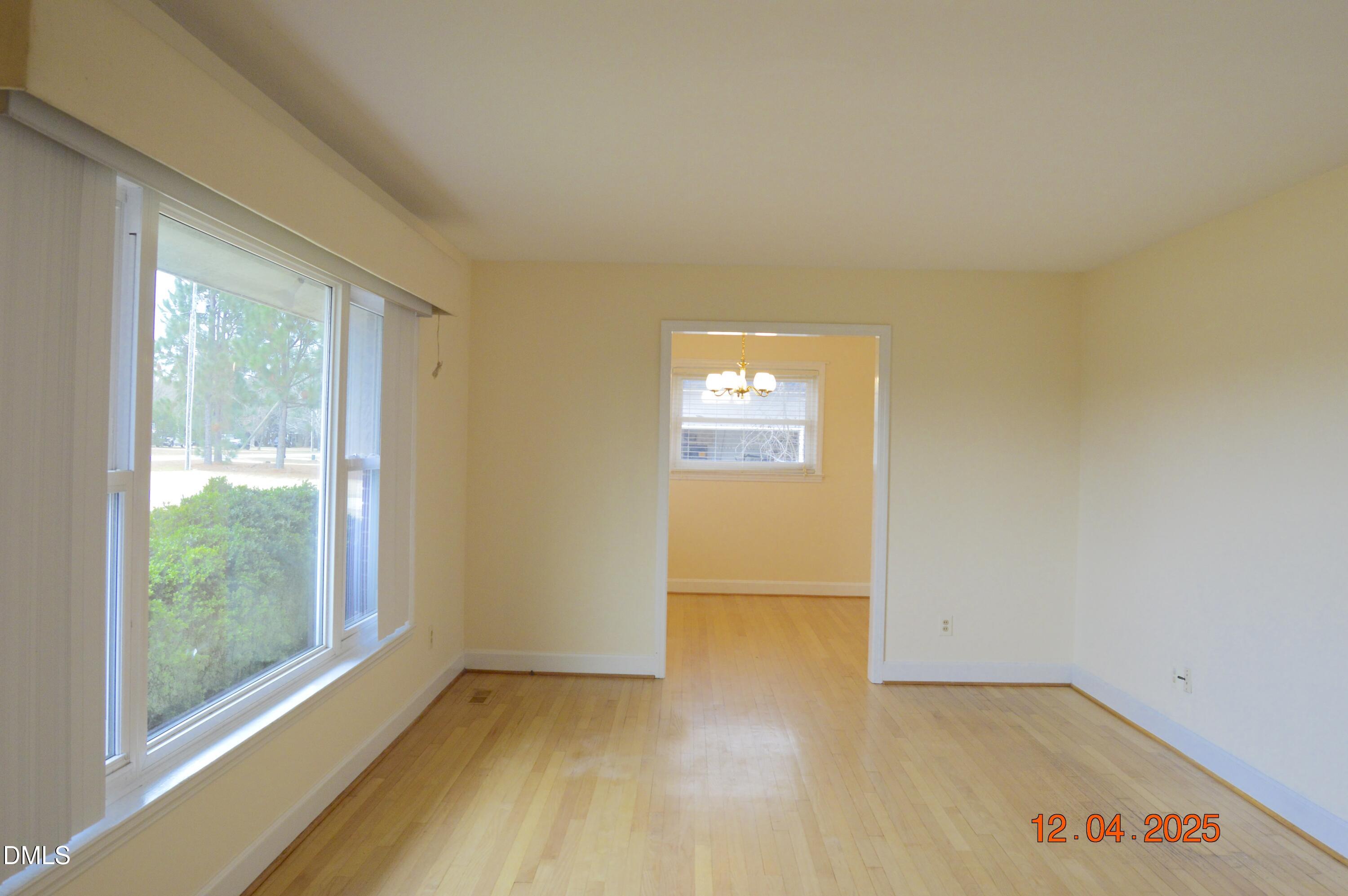 681 Polenta Road Smithfield, NC 27577 - Photo 12 of 34 an empty room with windows