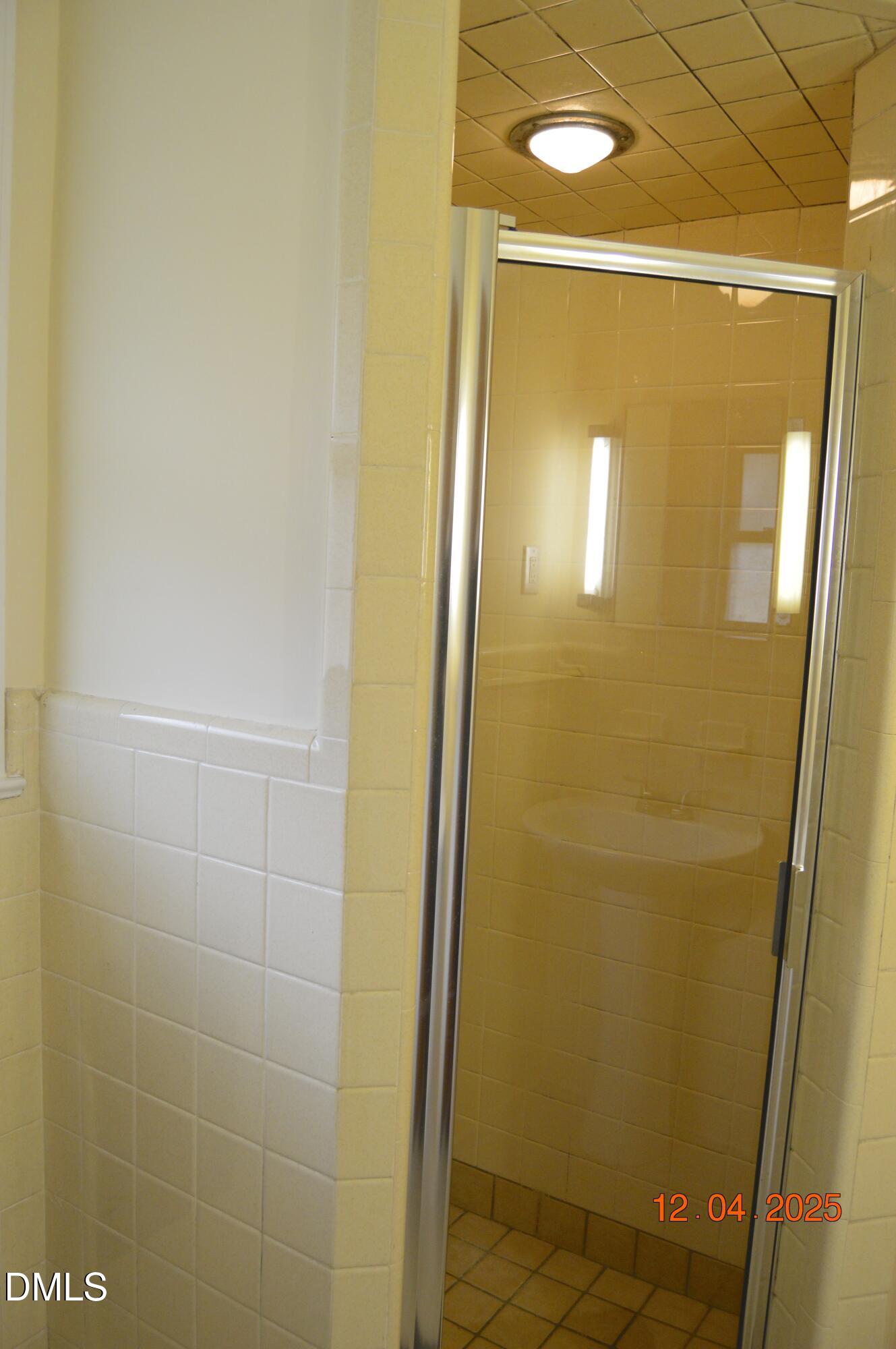 681 Polenta Road Smithfield, NC 27577 - Photo 14 of 34 a bathroom with a shower