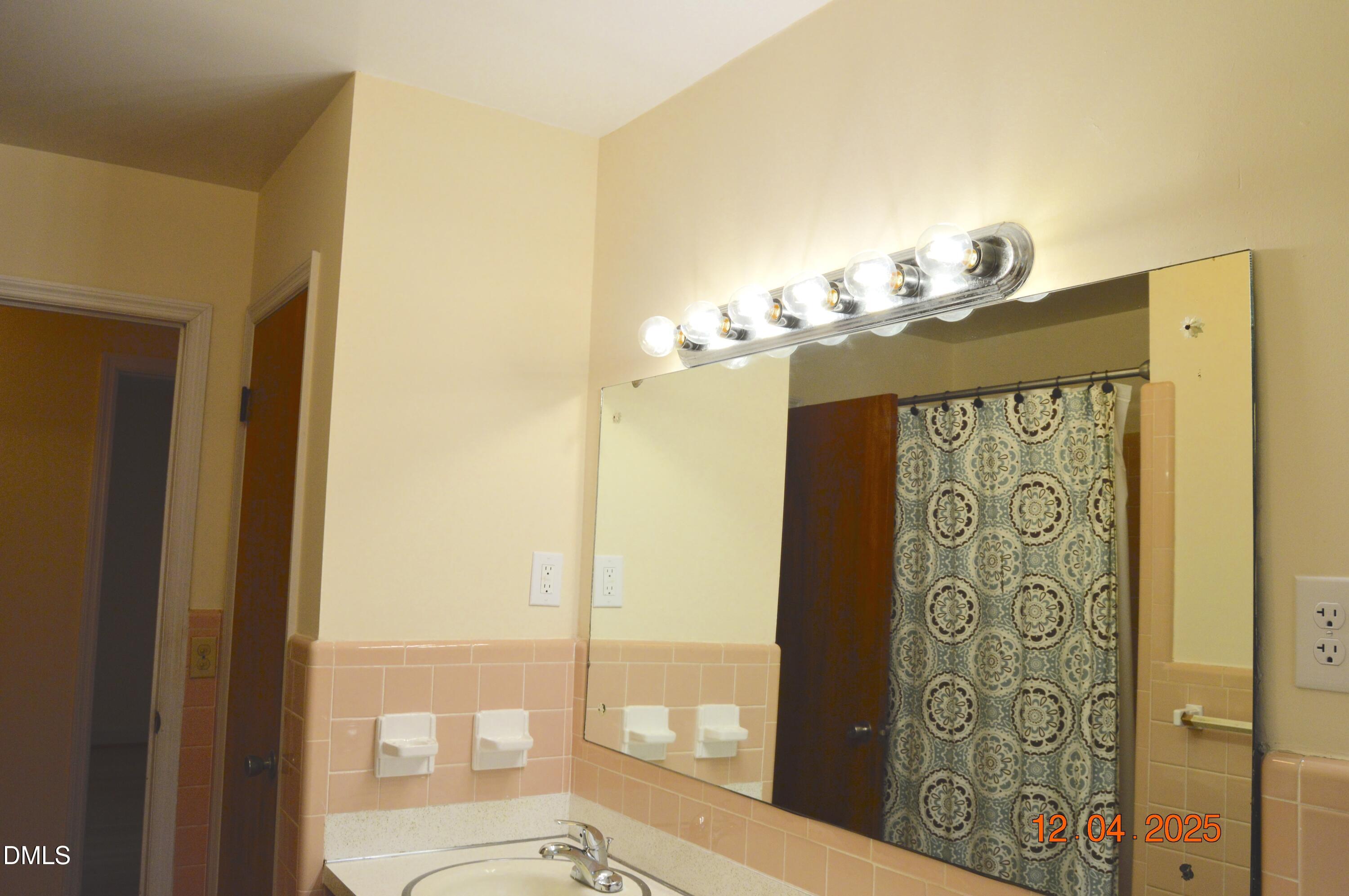 681 Polenta Road Smithfield, NC 27577 - Photo 15 of 34 a view of a bathroom with a shower