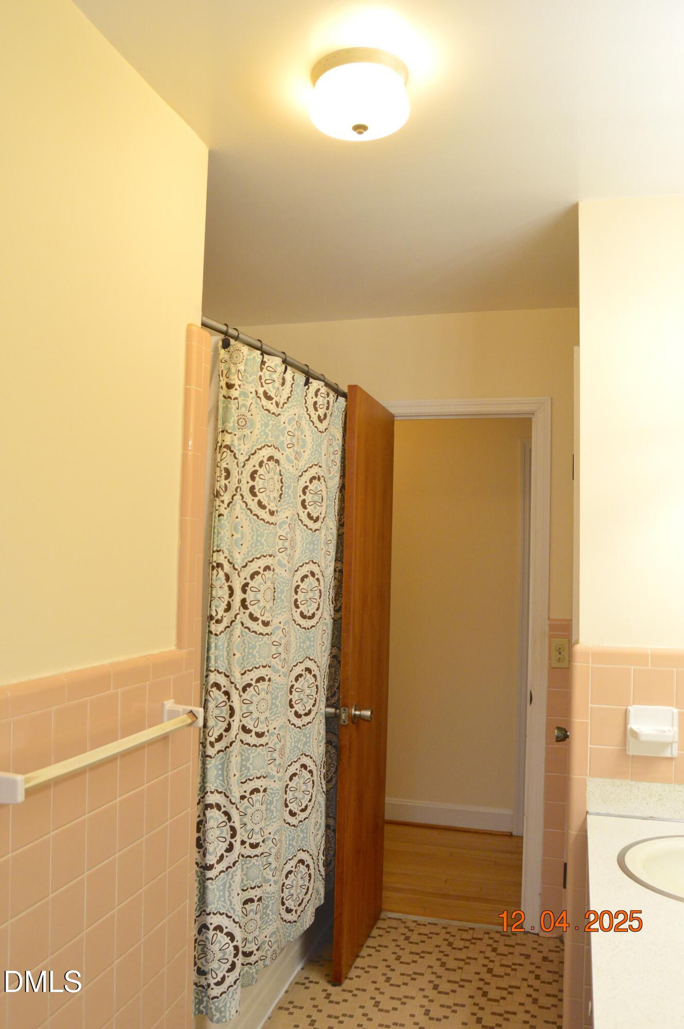 681 Polenta Road Smithfield, NC 27577 - Photo 16 of 34 a bathroom with a shower and a toilet