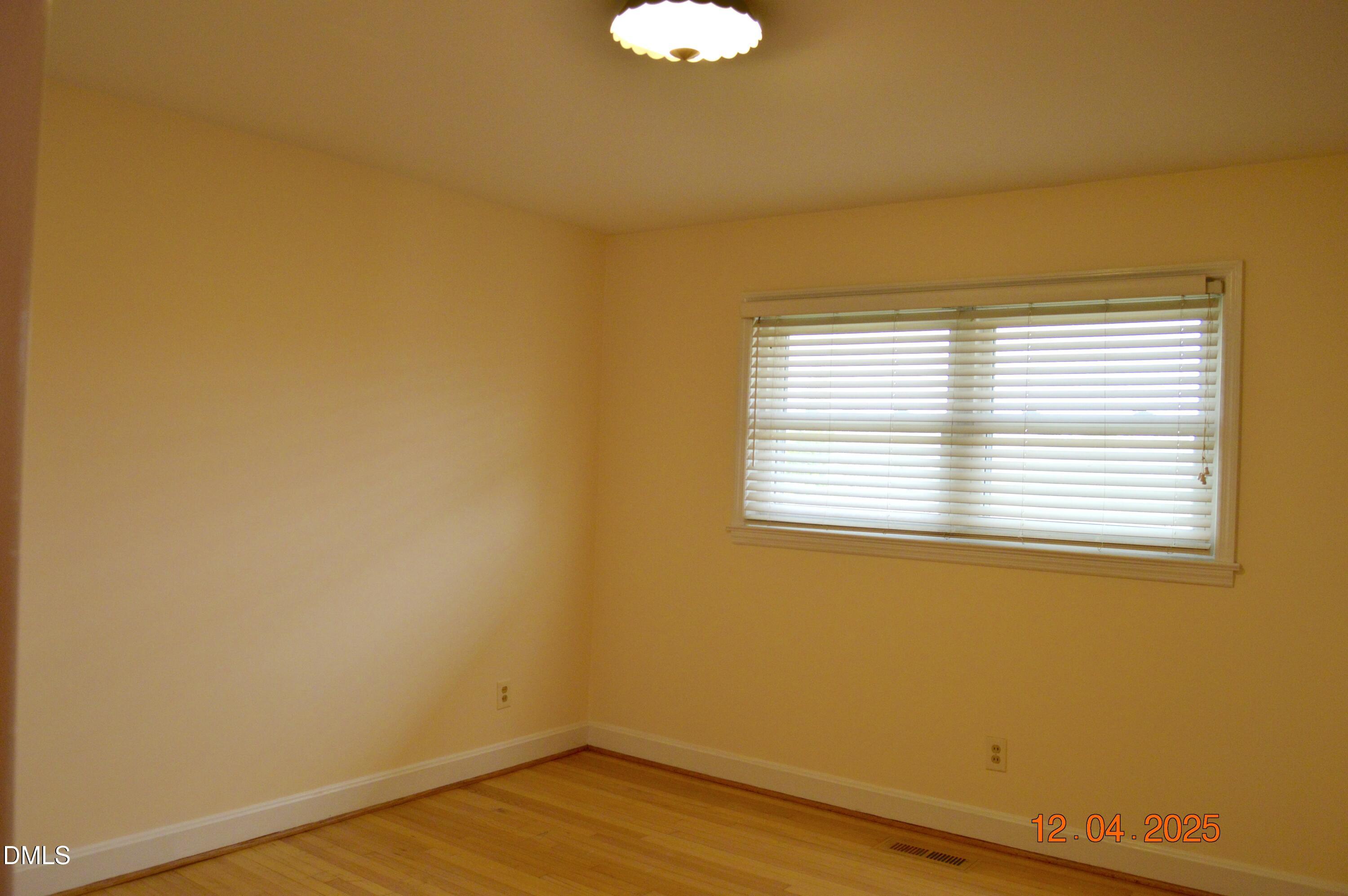 681 Polenta Road Smithfield, NC 27577 - Photo 17 of 34 a view of a room that has a window in it