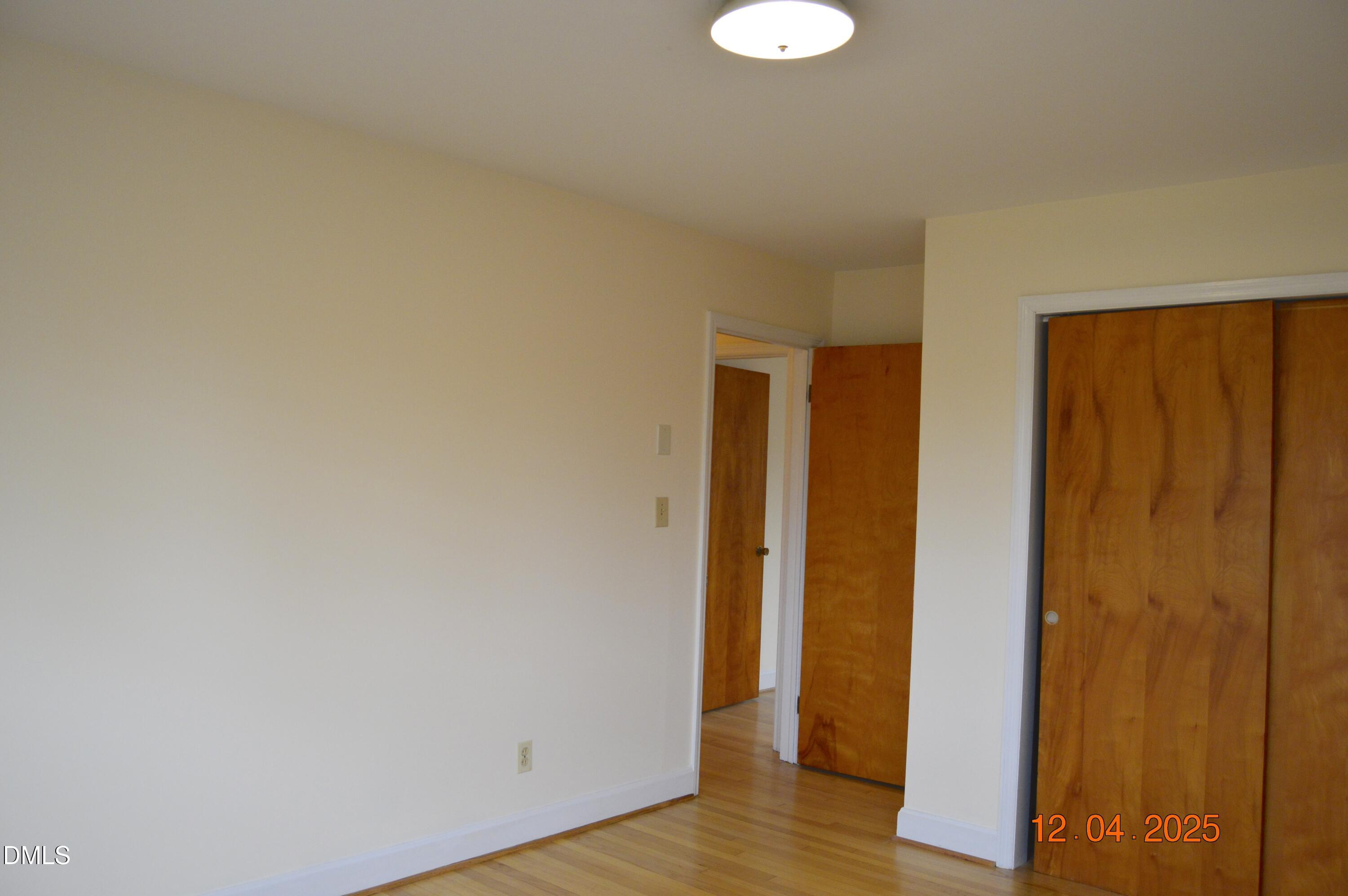 681 Polenta Road Smithfield, NC 27577 - Photo 20 of 34 a view of a room with wooden floor