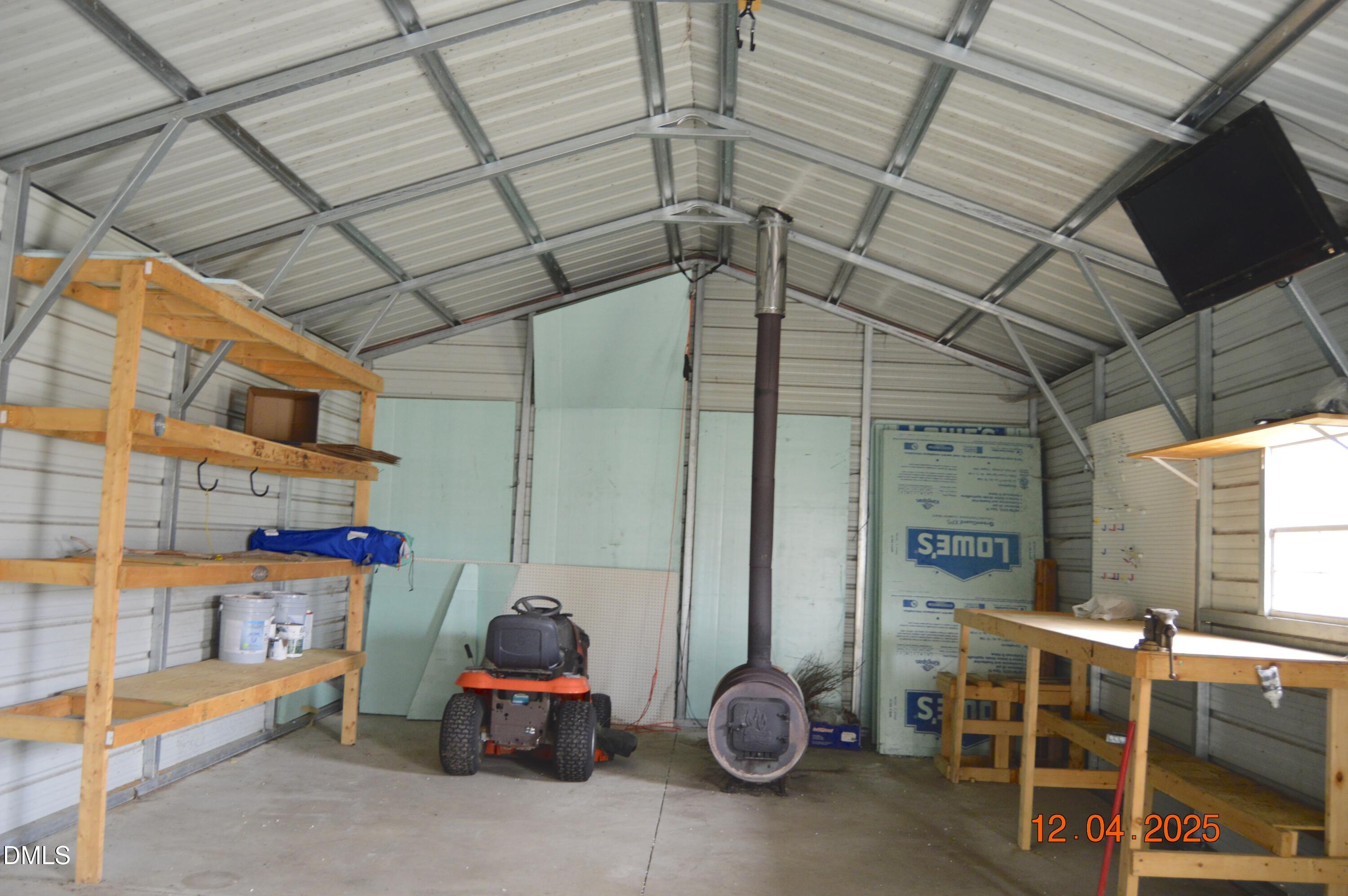 681 Polenta Road Smithfield, NC 27577 - Photo 31 of 34 a car parked in front of a building