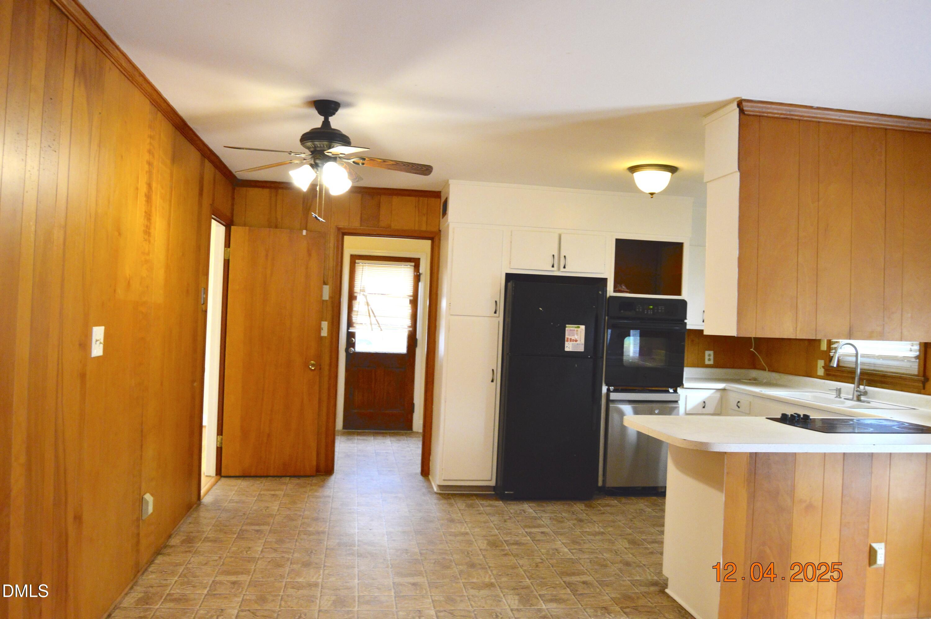 681 Polenta Road Smithfield, NC 27577 - Photo 7 of 34 a kitchen with stainless steel appliances granite countertop a refrigerator a sink and dishwasher