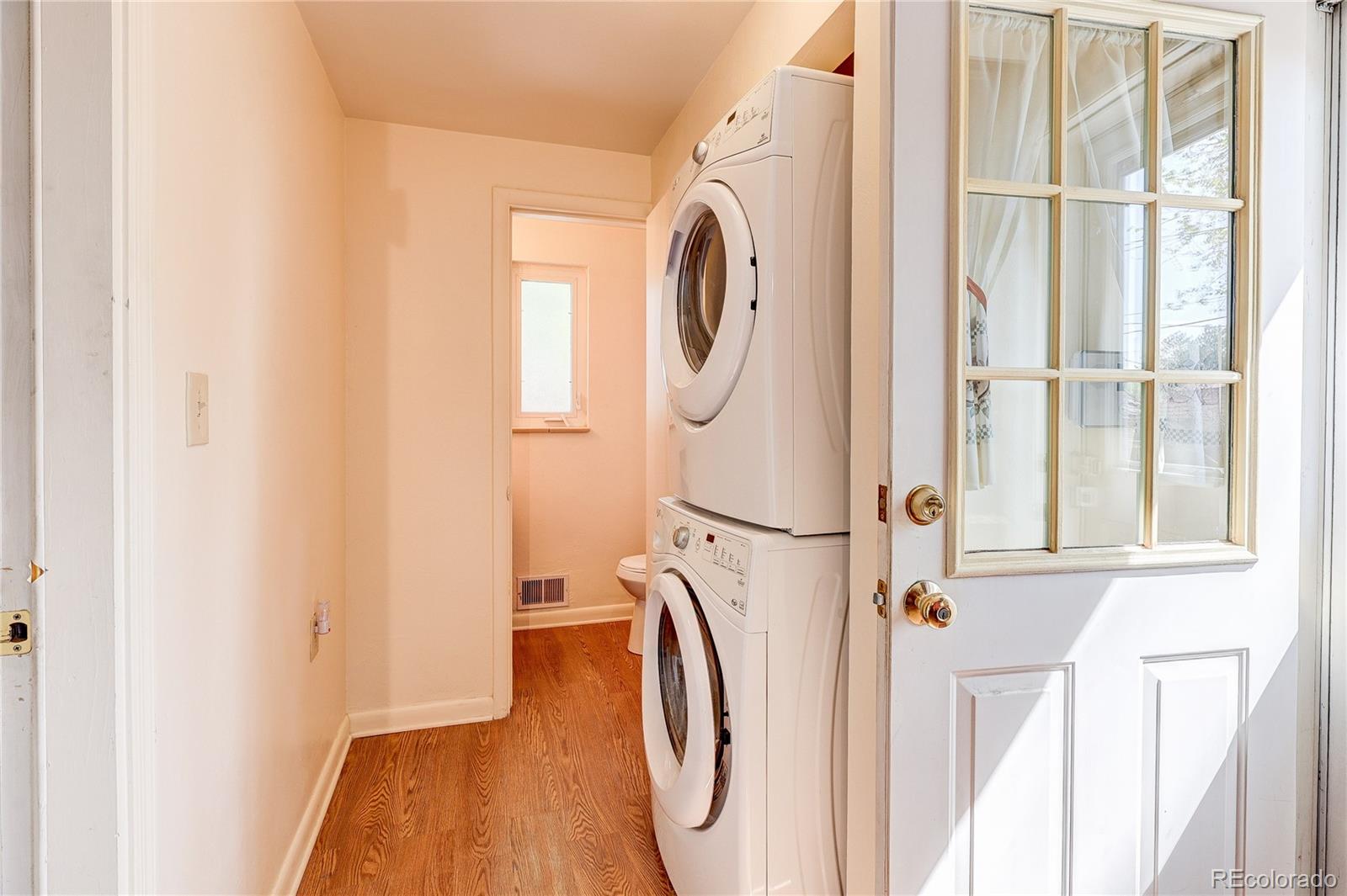 4570 Field Street Wheat Ridge, CO 80033 - Photo 25 of 44 a utility room with dryer and washer