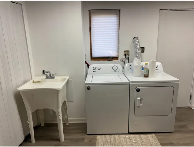 a utility room with dryer and washer
