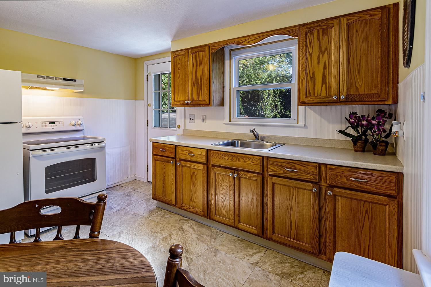 39 Taunton Road Medford, NJ 08055 - Photo 9 of 24 Wood cabinetry and door to backyard