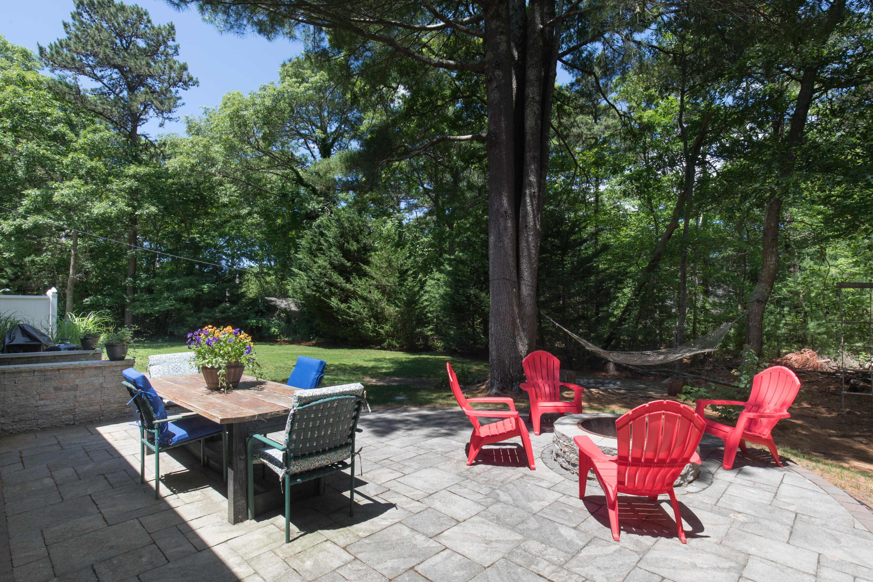 25 Weathervane Way Marstons Mills, MA 02632 - Photo 12 of 21 an outdoor sitting area with furniture and garden view