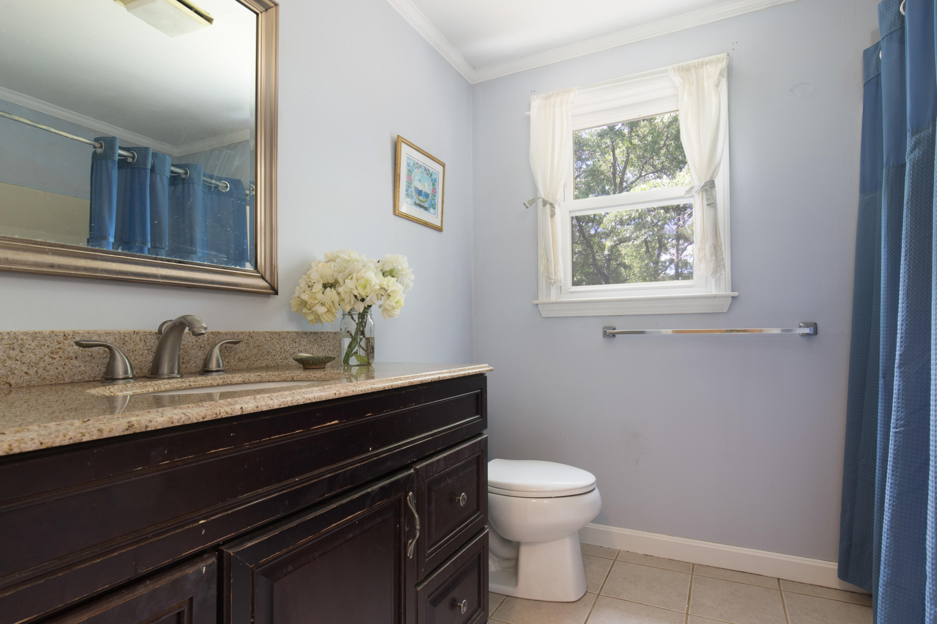 25 Weathervane Way Marstons Mills, MA 02632 - Photo 18 of 21 a bathroom with a granite countertop sink and a toilet