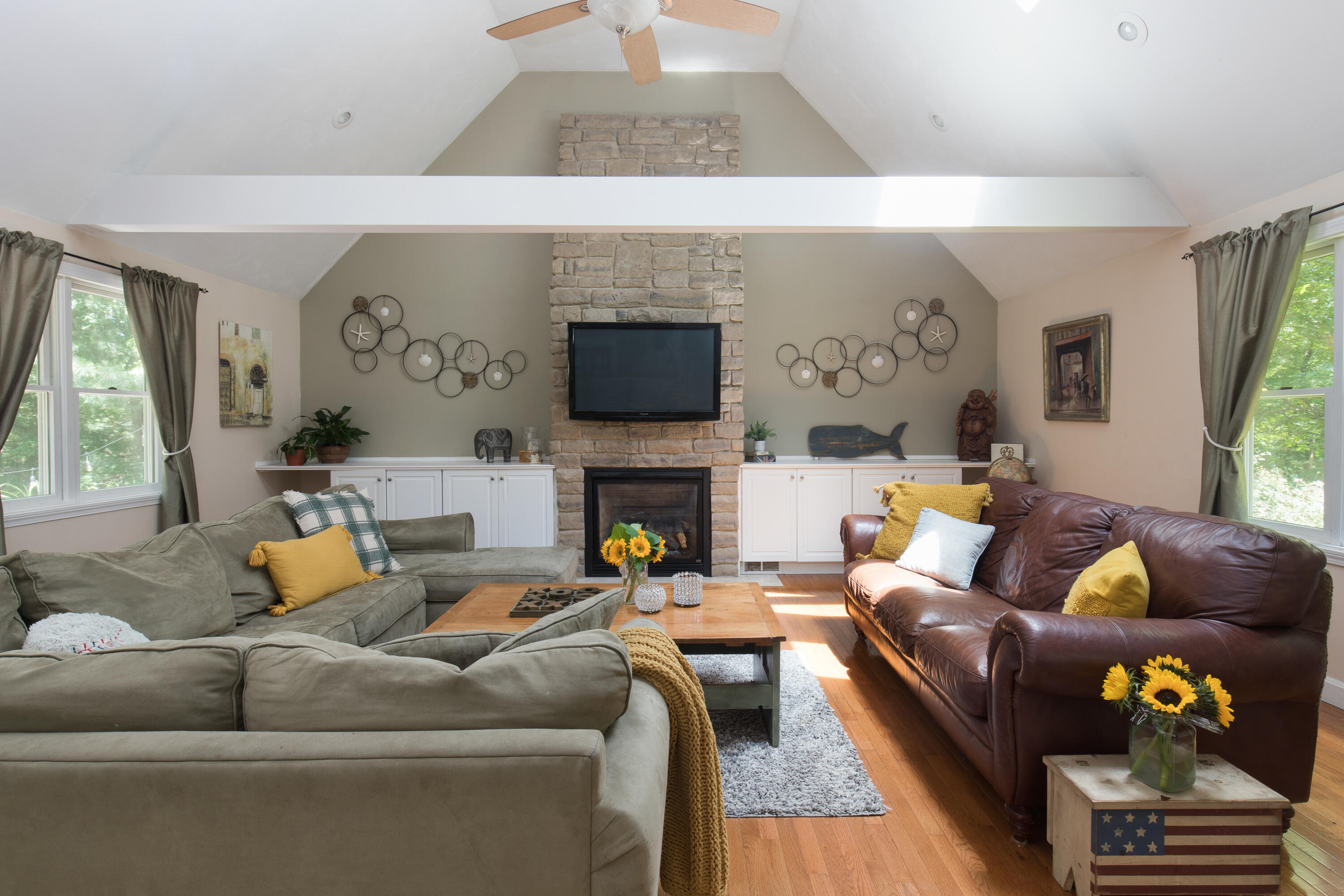 25 Weathervane Way Marstons Mills, MA 02632 - Photo 4 of 21 a living room with furniture fireplace and a large window