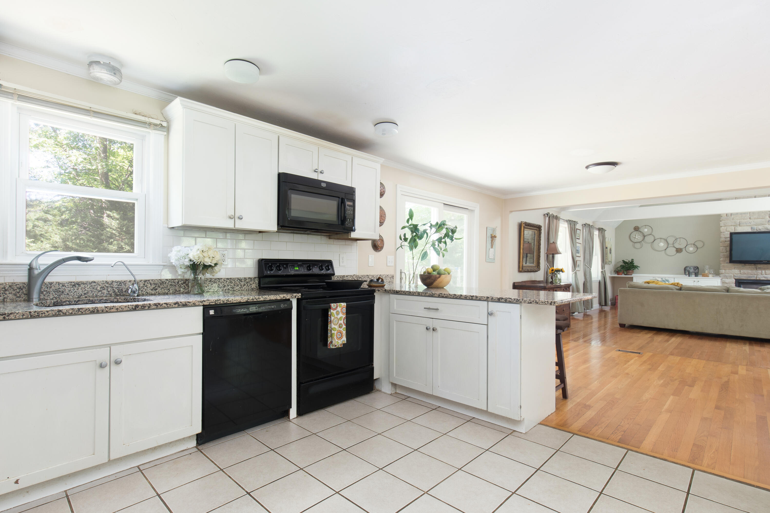 25 Weathervane Way Marstons Mills, MA 02632 - Photo 6 of 21 a kitchen with a sink and cabinets