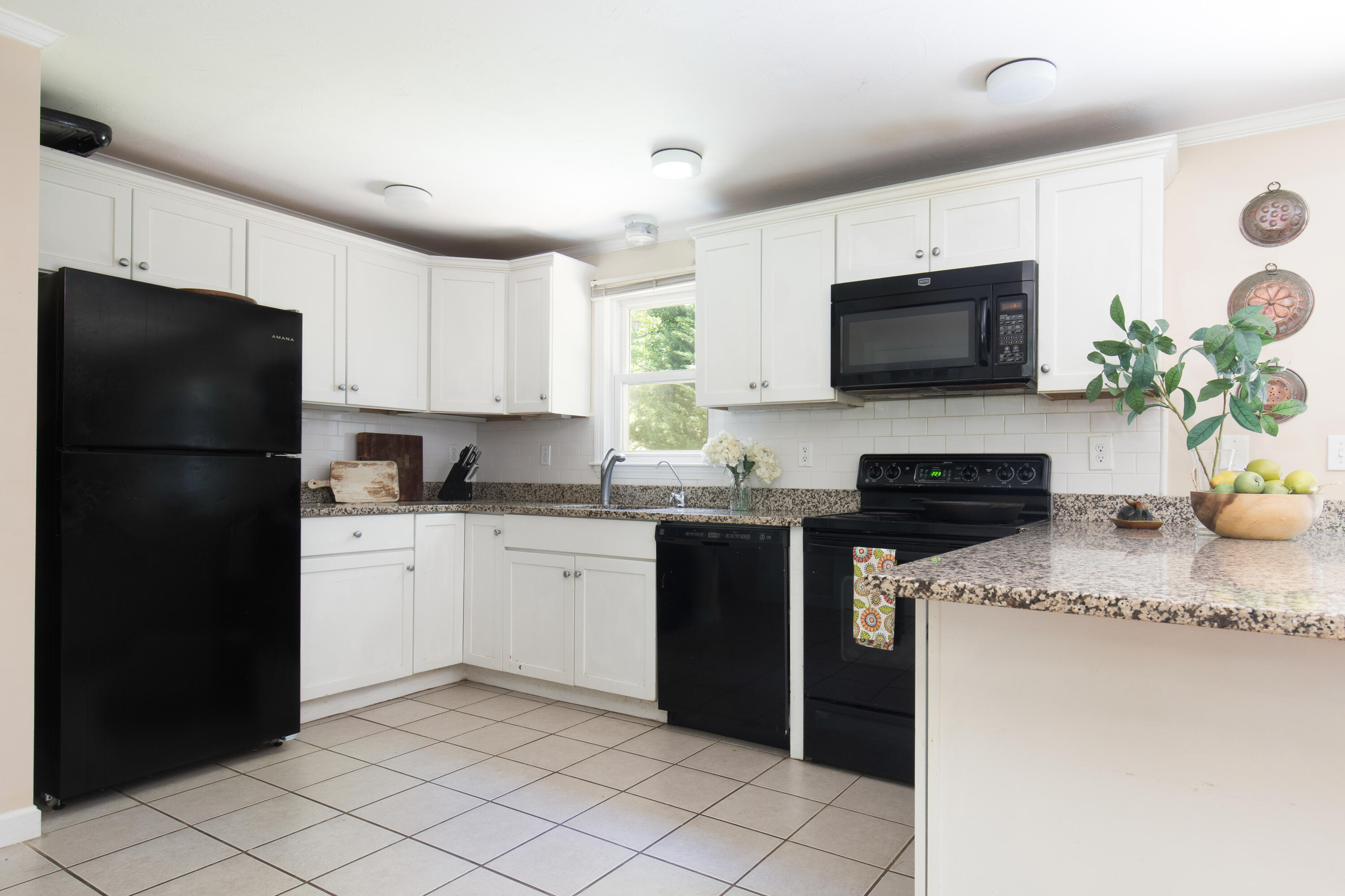 25 Weathervane Way Marstons Mills, MA 02632 - Photo 8 of 21 a kitchen with a refrigerator and a stove top oven