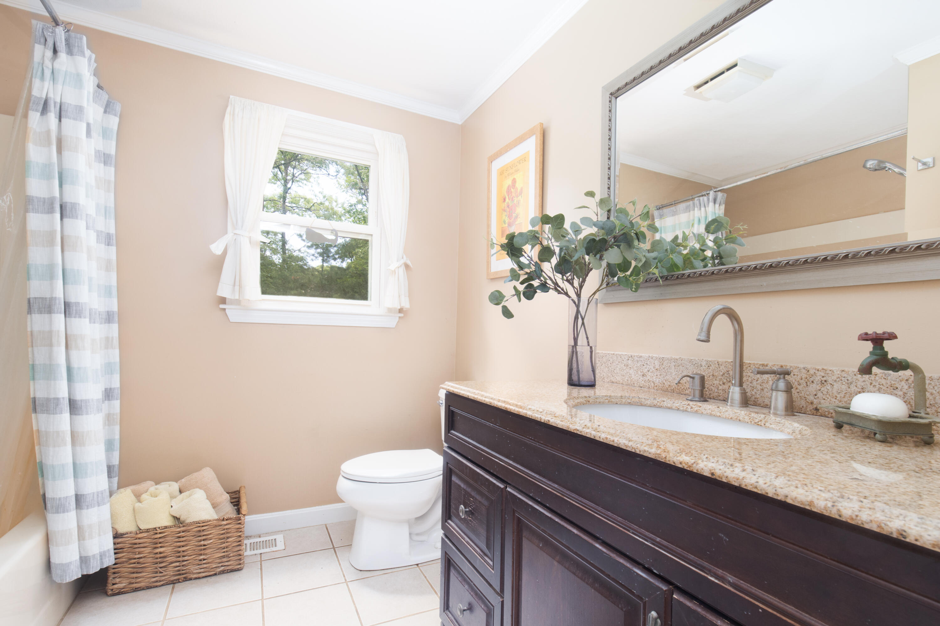 25 Weathervane Way Marstons Mills, MA 02632 - Photo 9 of 21 a bathroom with a granite countertop sink a toilet and mirror