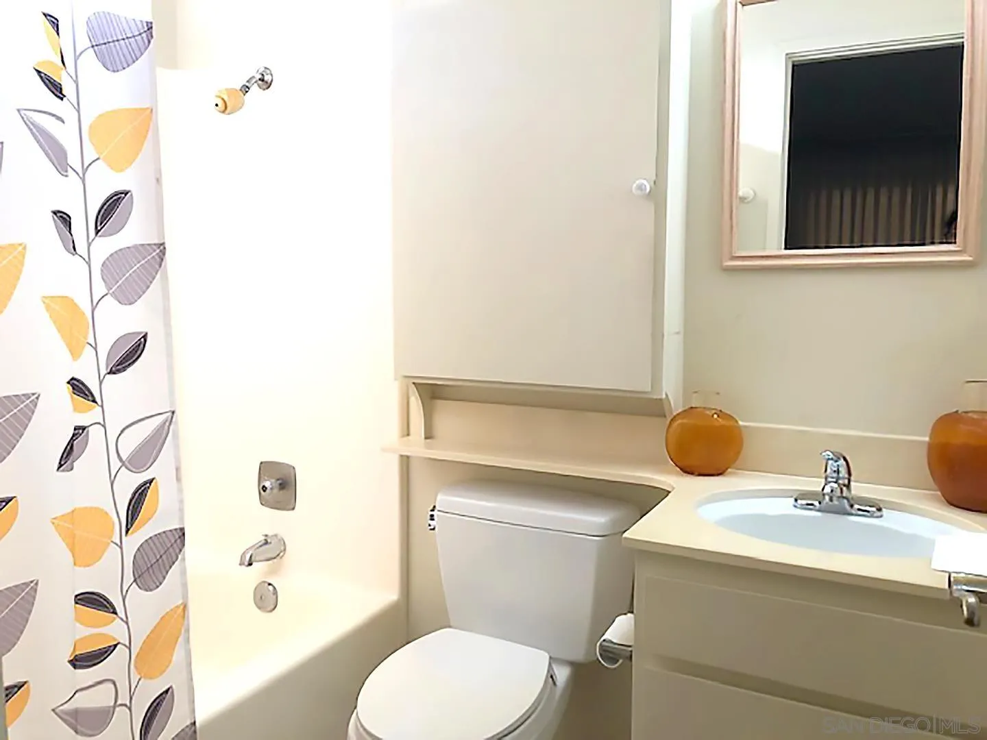1771 Round Tree Drive Oceanside, CA 92056 - Photo 12 of 14 a bathroom with a sink and a toilet
