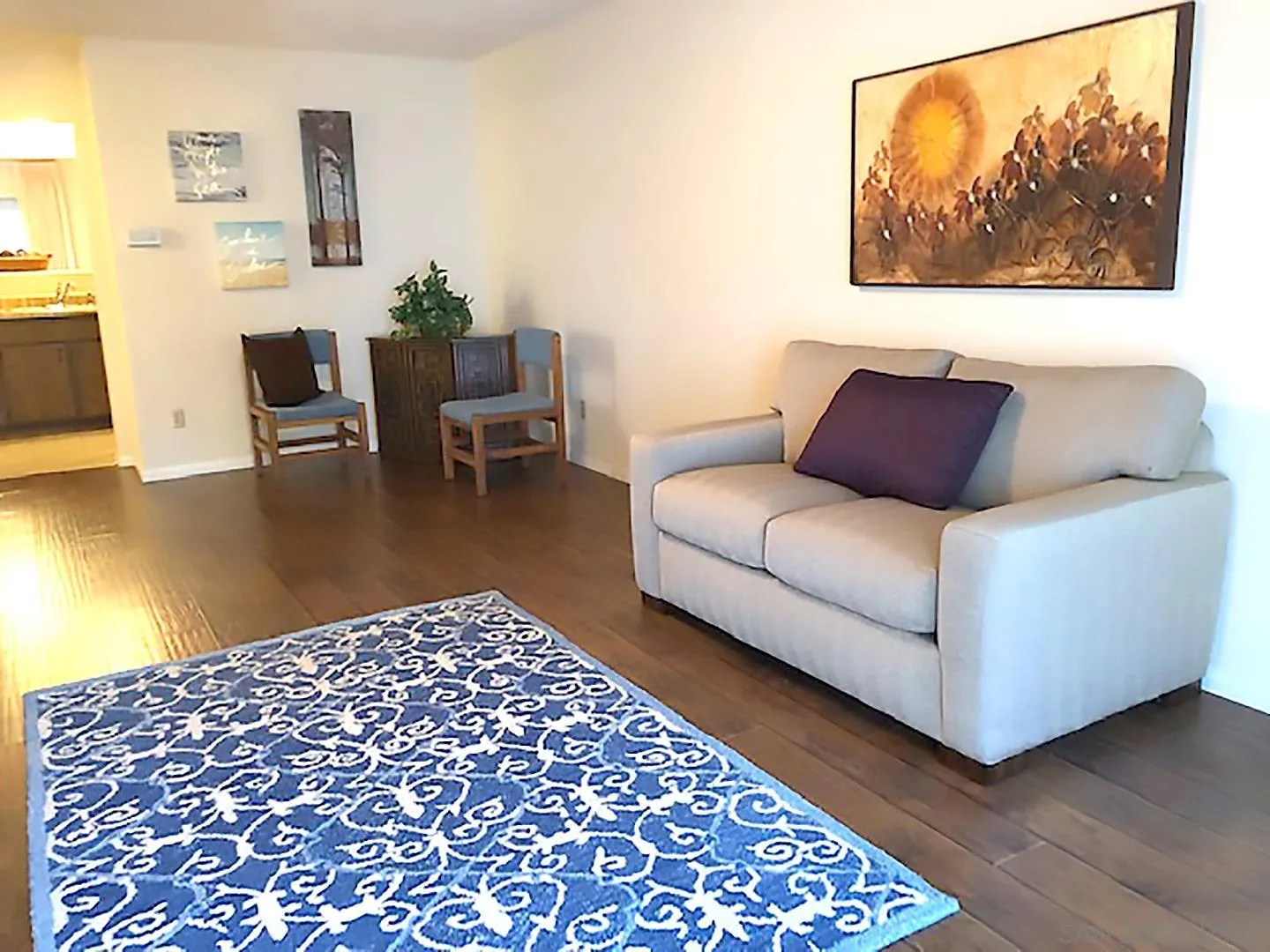 1771 Round Tree Drive Oceanside, CA 92056 - Photo 2 of 14 a living room with a couch and a coffee table