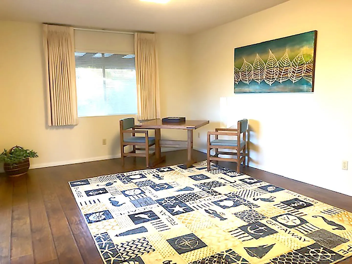 1771 Round Tree Drive Oceanside, CA 92056 - Photo 3 of 14 a bed sitting in a bedroom next to a window