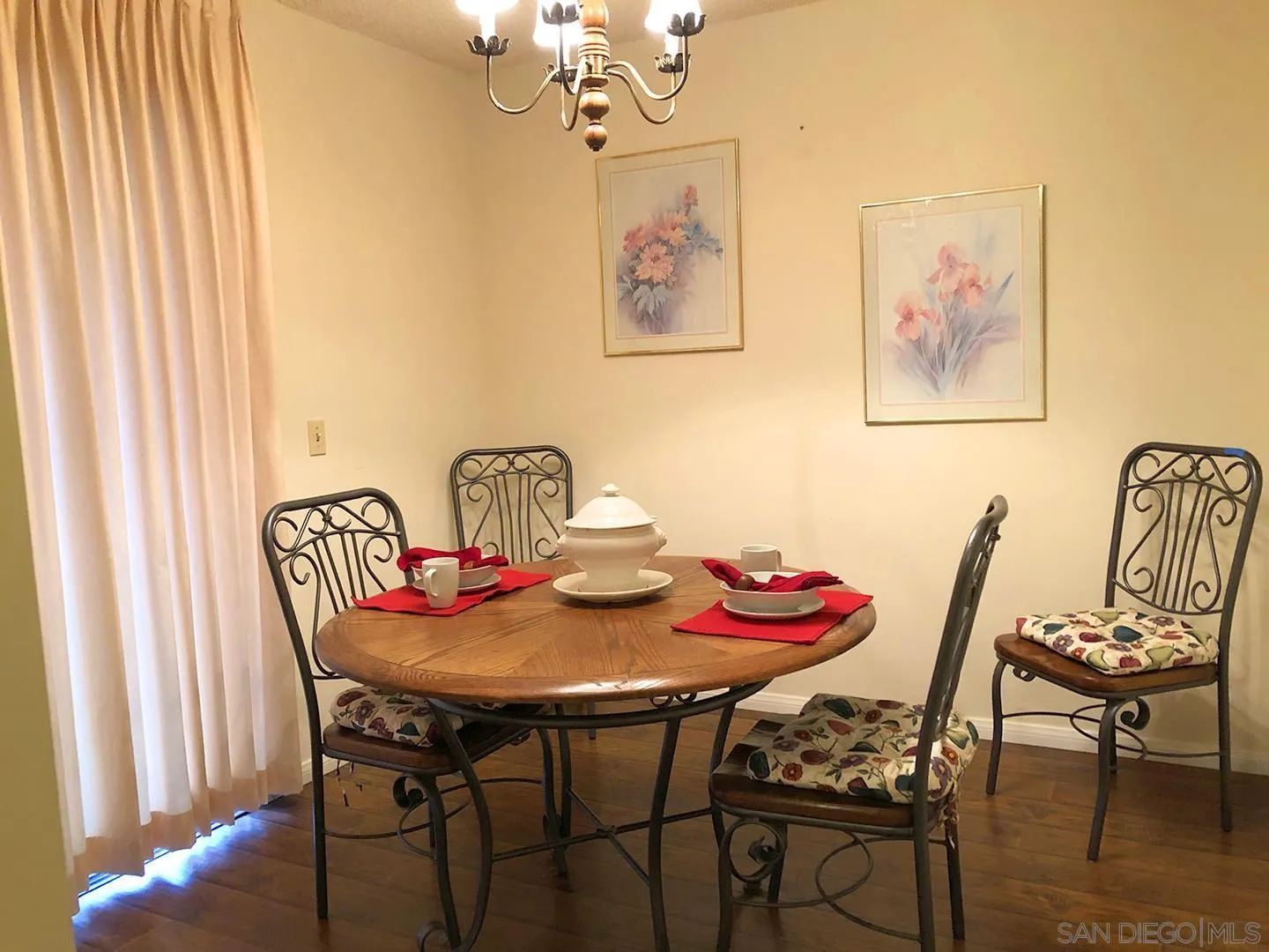 1771 Round Tree Drive Oceanside, CA 92056 - Photo 4 of 14 a view of a dining room with furniture and wooden floor