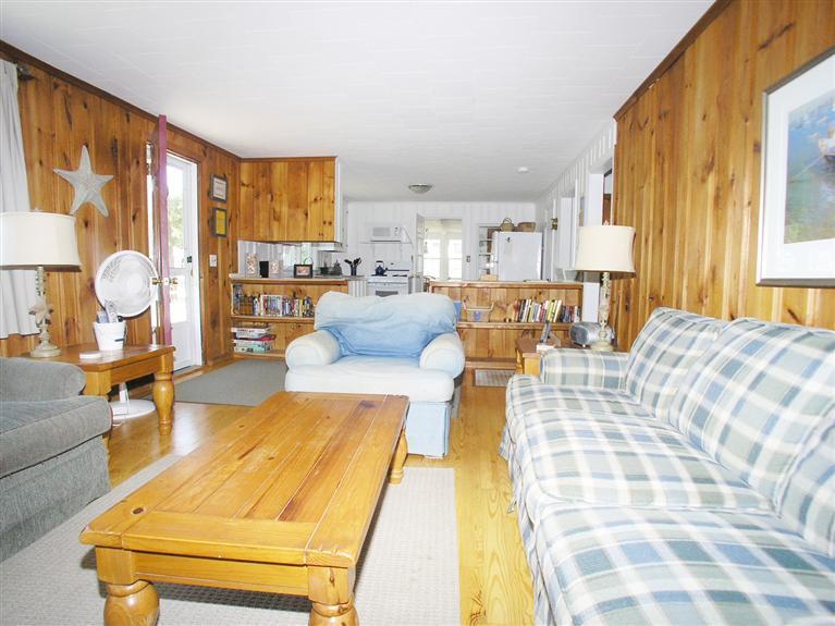 26 Edwards Road Dennis Port, MA 02639 - Photo 13 of 14 a living room with furniture and a large window