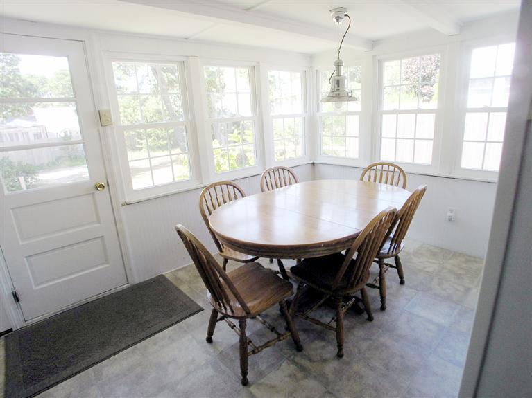 26 Edwards Road Dennis Port, MA 02639 - Photo 6 of 14 a dining room with furniture and window