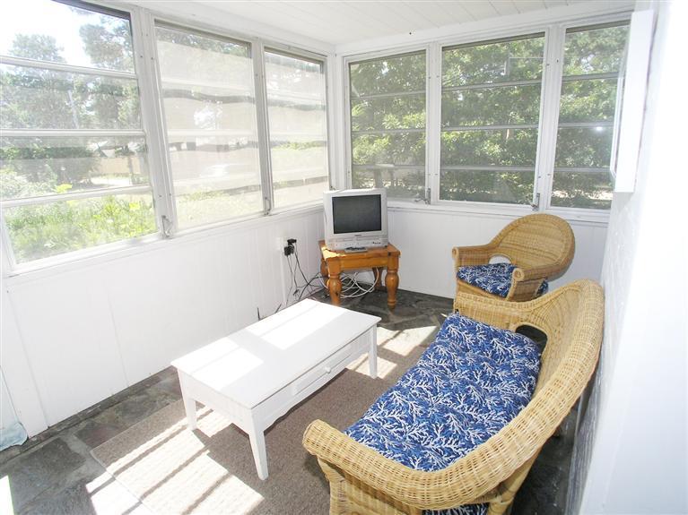 26 Edwards Road Dennis Port, MA 02639 - Photo 7 of 14 a room with furniture and a window