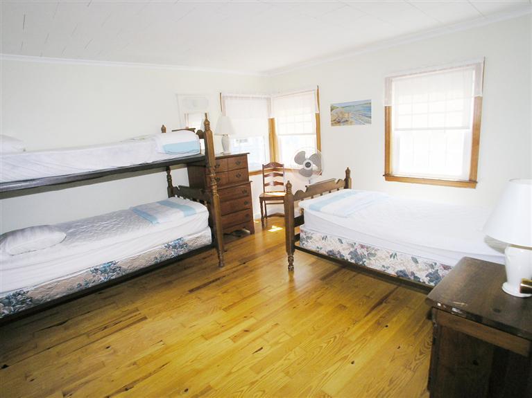 26 Edwards Road Dennis Port, MA 02639 - Photo 10 of 14 a bedroom with bed and window