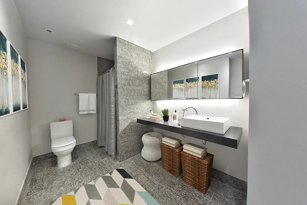 20 Pine Street, Unit 910 Manhattan, NY 10005 - Photo 4 of 17 a bathroom with a sink toilet and mirror
