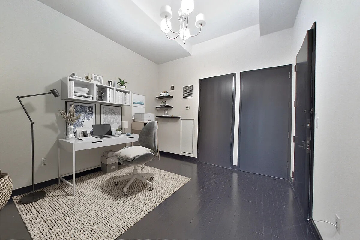20 Pine Street, Unit 910 Manhattan, NY 10005 - Photo 7 of 17 a living room with furniture and decor
