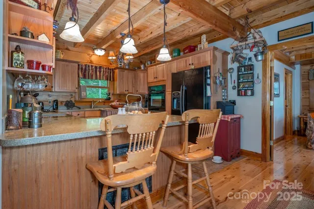 a bed sitting in a room next to a window